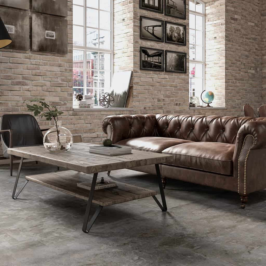 sofa de piel y decoración industrial